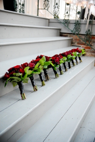 Enchanted Florist Bridal Party with Red Bouquets