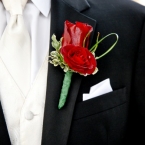 Enchanted Florist Red Boutonniere Close Up