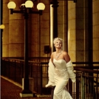 b. Hughes Bridal Badgley Mischka Gown Bride Standing at the Top of Stairwell