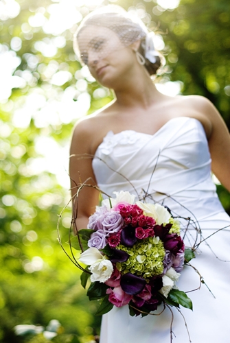 Enchanted Florist Bride with Pink and Purple Bouquet