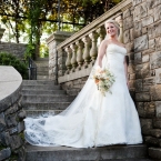 b. Hughes Bridal Bride on Staircase Wearing White Vera Wang Gown