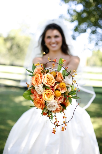 Enchanted Florist Bride with Orange Bouquet