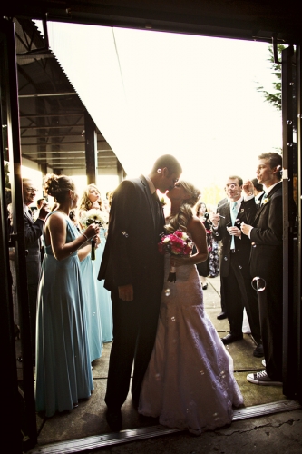 Wedding Day by jHenderson Studios Franklin Factory Wedding Bride and Groom Kissing