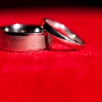 Red and Blue DIY Wedding by Jonathon Campbell Photography Rings displayed on Red