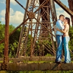 Jonathon Campbell Photography Engagement Photo of Couple Standing Under Electric Post