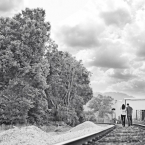 Jonathon Campbell Photography Engagement Photo of Couple on Railroad Tracks
