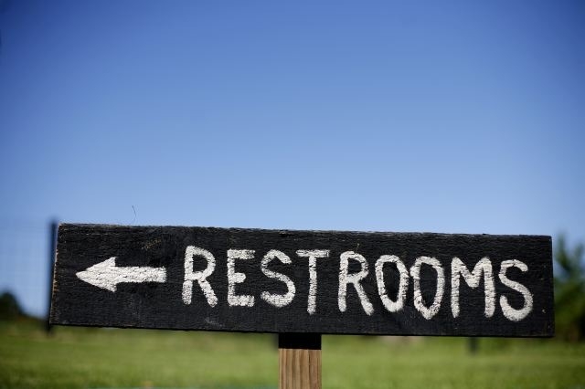 Enchanted Florist Southern Farm Wedding Photo of Restroom Sign
