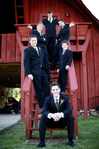 Enchanted Florist Southern Farm Wedding Photo of Groomsment Standing on Barn Steps