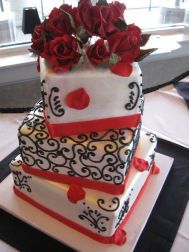 Signature Cakes by Vicki - Orange with Black Swirls