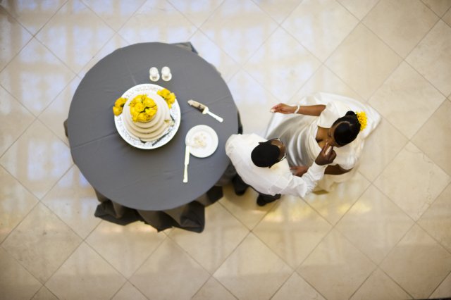 bride, groom, cake table, yellow, white, grey, nashville wedding, union station
